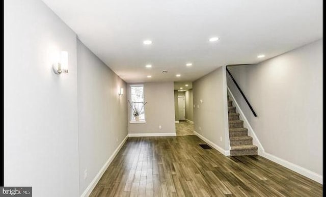 interior space with dark wood-type flooring