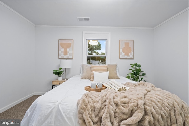 carpeted bedroom with crown molding