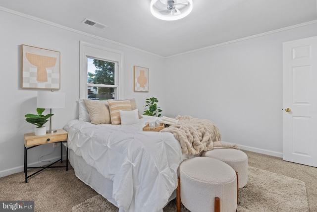 carpeted bedroom with crown molding