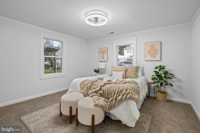 bedroom featuring crown molding and carpet floors