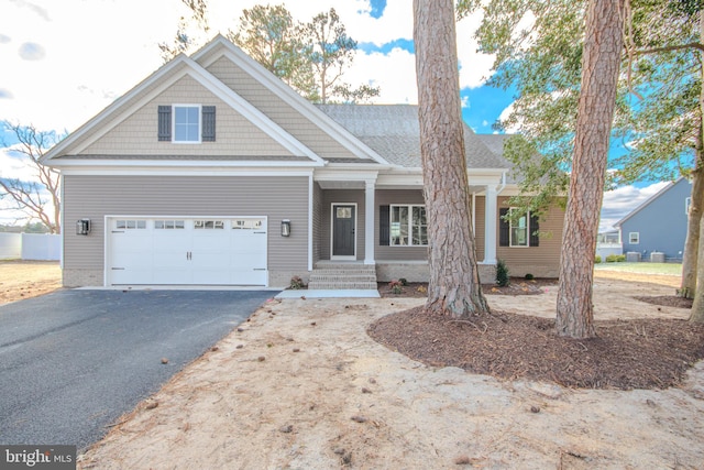 craftsman-style house featuring a garage