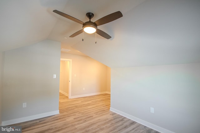 bonus room with ceiling fan, lofted ceiling, and light wood-type flooring