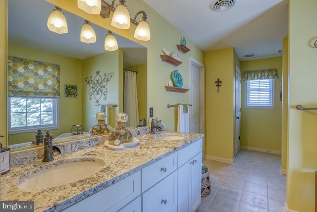 bathroom featuring vanity and tile patterned flooring