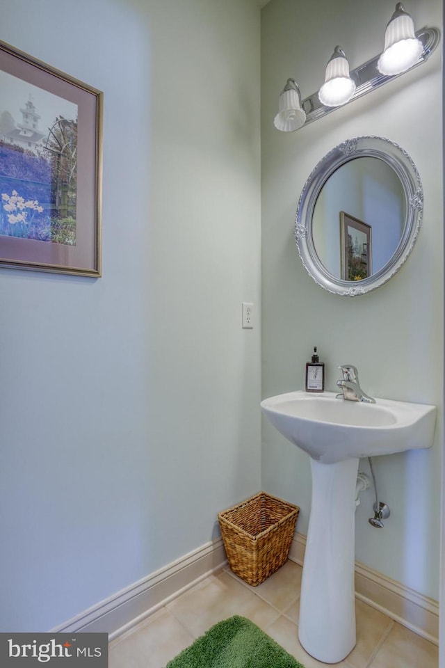 bathroom with tile patterned flooring