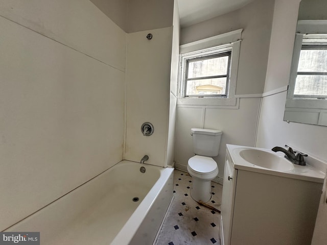 full bathroom with vanity, a healthy amount of sunlight, toilet, and shower / washtub combination