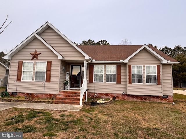 view of front facade featuring a front lawn