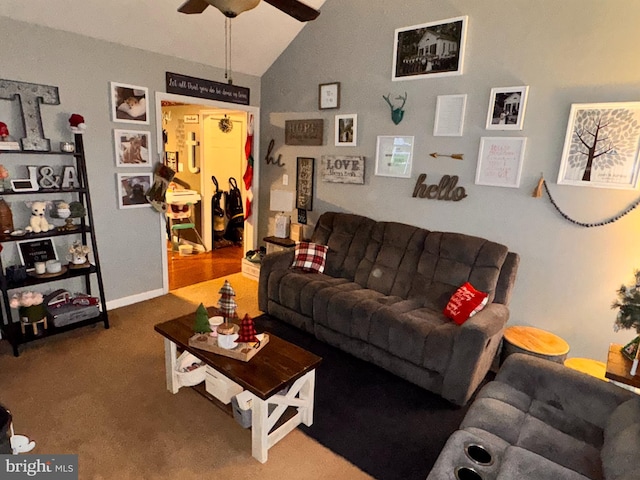 living room with carpet flooring, ceiling fan, and lofted ceiling