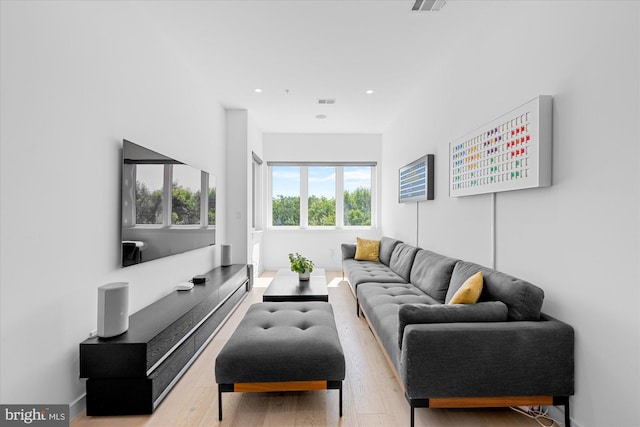 living room with light hardwood / wood-style floors