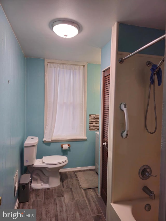 bathroom with  shower combination and toilet