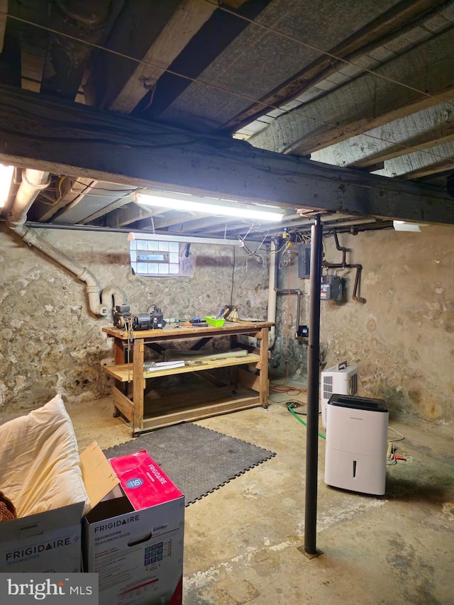 basement with a workshop area