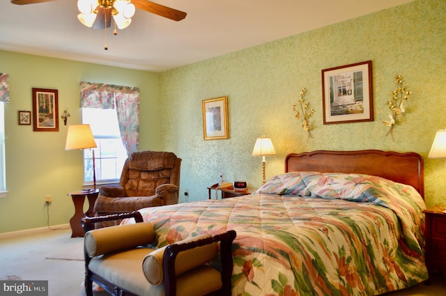 bedroom with ceiling fan and carpet floors