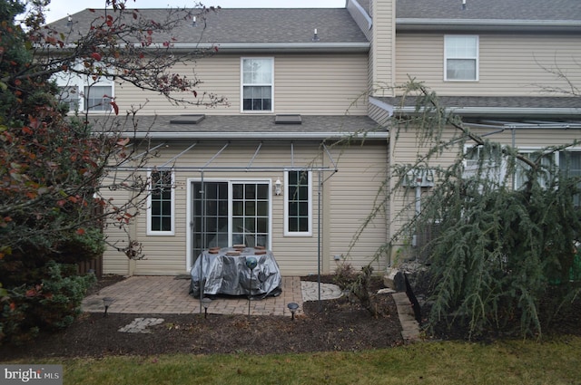 rear view of house with a patio area