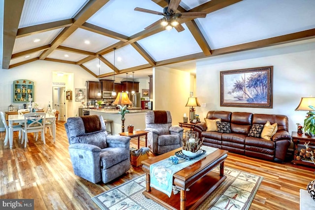 living room with beam ceiling, ceiling fan, high vaulted ceiling, and light hardwood / wood-style floors