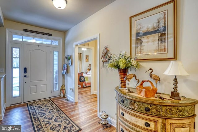 foyer with light wood-type flooring