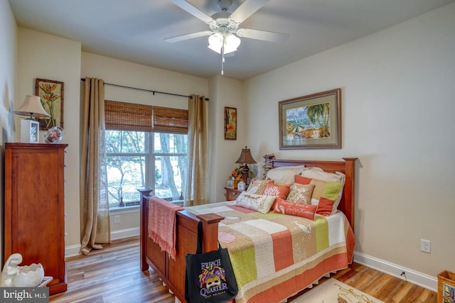 bedroom featuring ceiling fan and light wood-type flooring