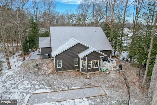 view of snow covered property