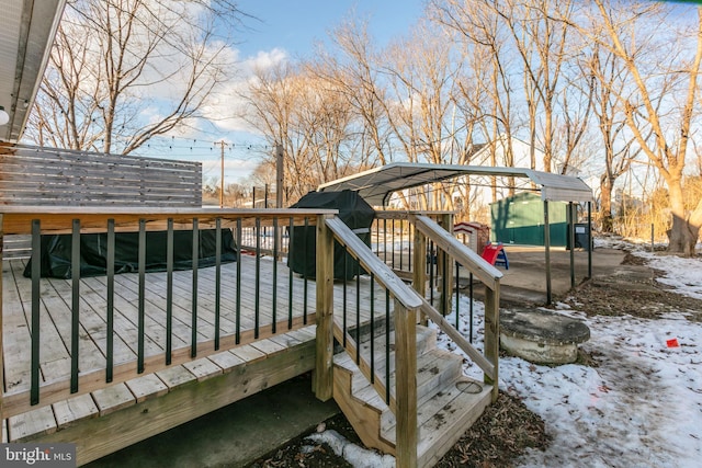 view of snow covered deck