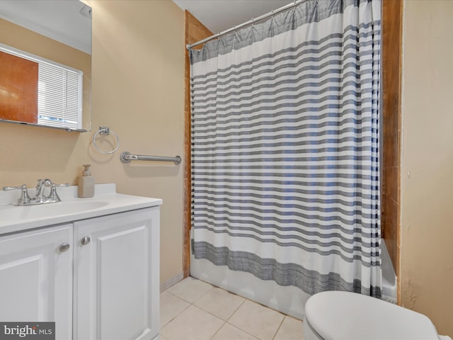 full bathroom featuring tile patterned flooring, shower / bath combo, vanity, and toilet