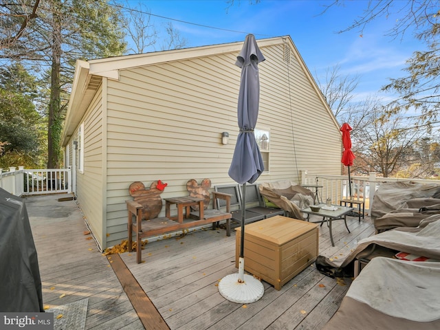 deck with an outdoor hangout area