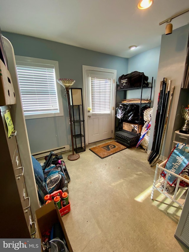 bedroom featuring baseboard heating