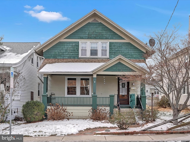 view of front of home featuring covered porch