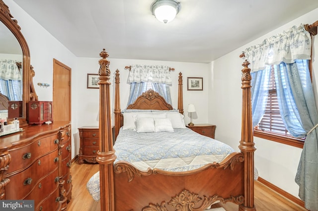 bedroom with light wood-type flooring