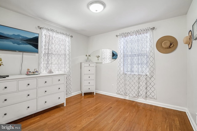 unfurnished bedroom with light hardwood / wood-style floors