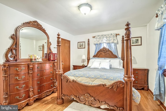 bedroom with light hardwood / wood-style flooring