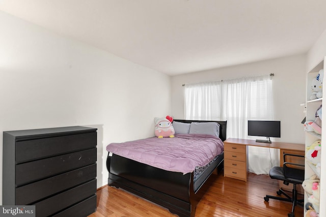 bedroom featuring light hardwood / wood-style flooring