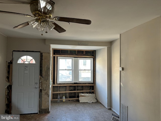 entrance foyer with ceiling fan