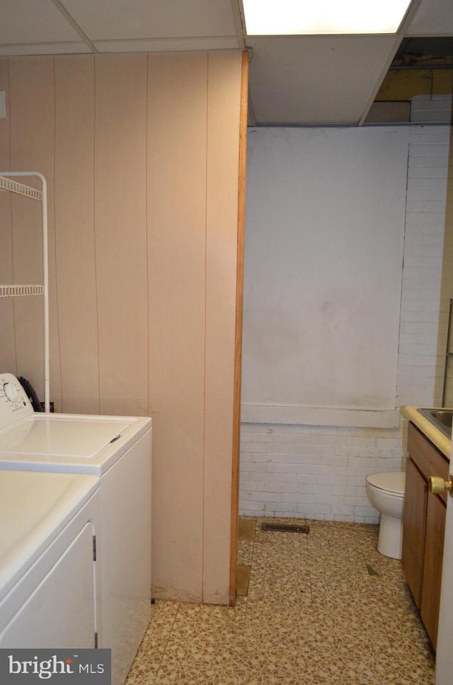 laundry area featuring washing machine and dryer