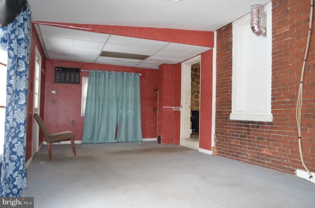 interior space featuring a paneled ceiling