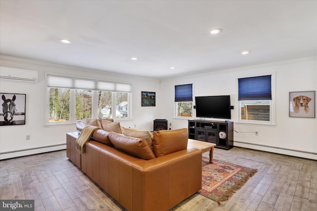 living room with an AC wall unit, ornamental molding, and a baseboard heating unit