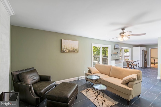 living room with ceiling fan