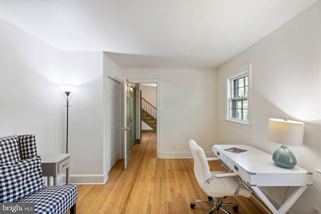 office area with light wood-type flooring