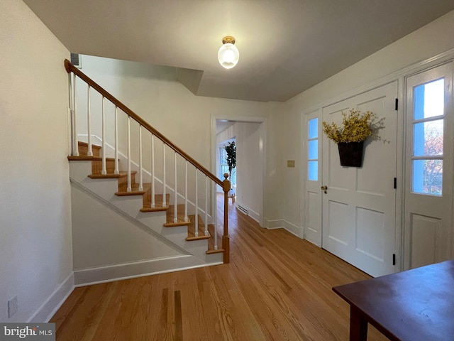 entrance foyer with hardwood / wood-style flooring