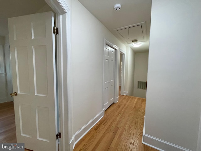 hallway featuring light wood-type flooring