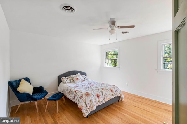 bedroom featuring ceiling fan and wood-type flooring