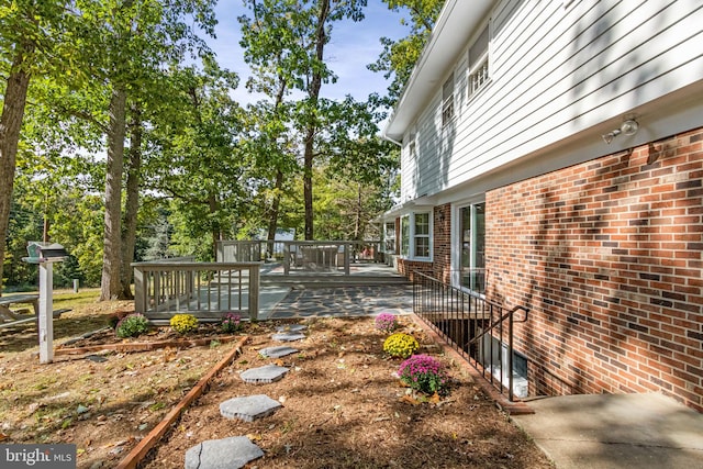 view of yard with a deck