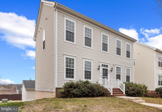 view of front of property with a front lawn