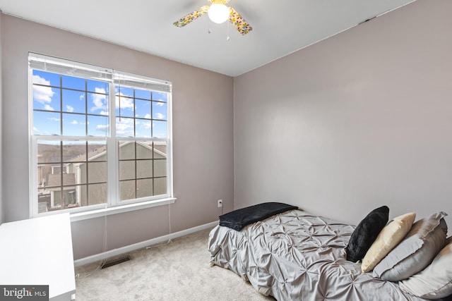 bedroom featuring carpet and ceiling fan