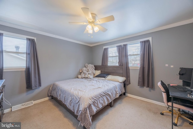 bedroom featuring ceiling fan, light colored carpet, and ornamental molding