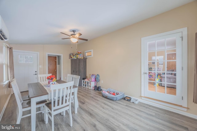 dining area featuring ceiling fan and light hardwood / wood-style flooring