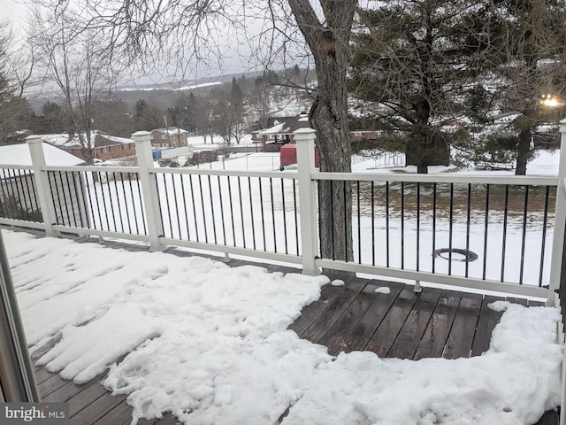 view of snow covered deck