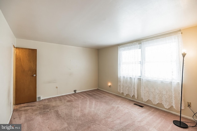 spare room with carpet flooring