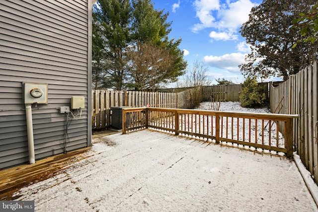 view of snow covered deck