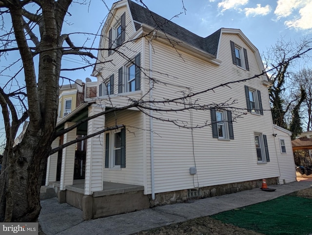 view of home's exterior with a patio