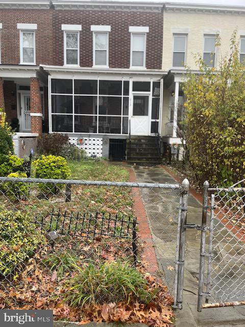 exterior space with a sunroom