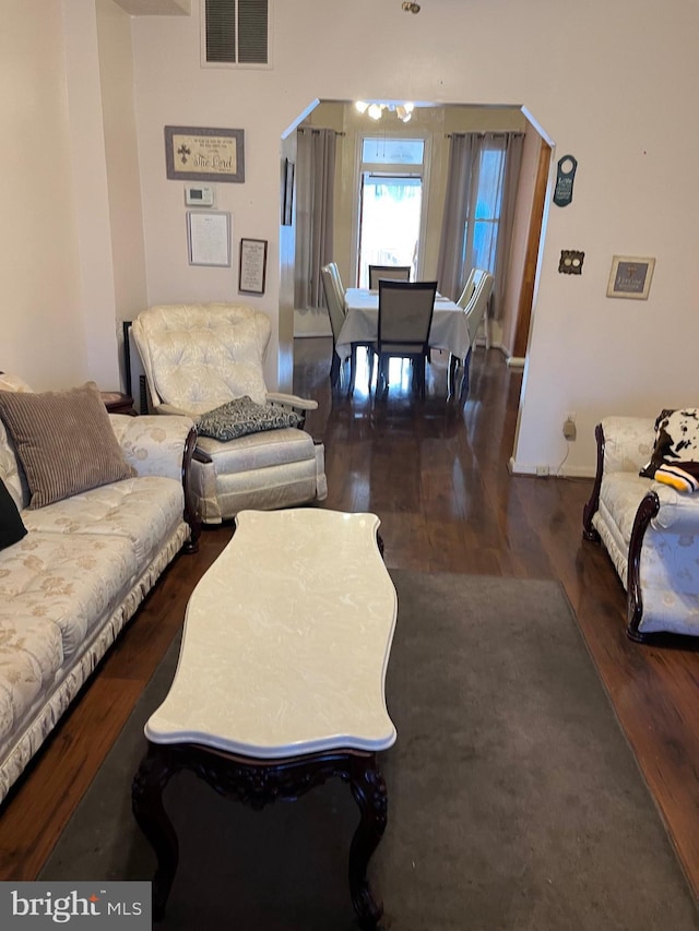 living room featuring dark hardwood / wood-style flooring