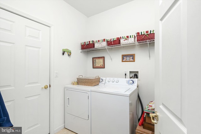 laundry area featuring washing machine and dryer